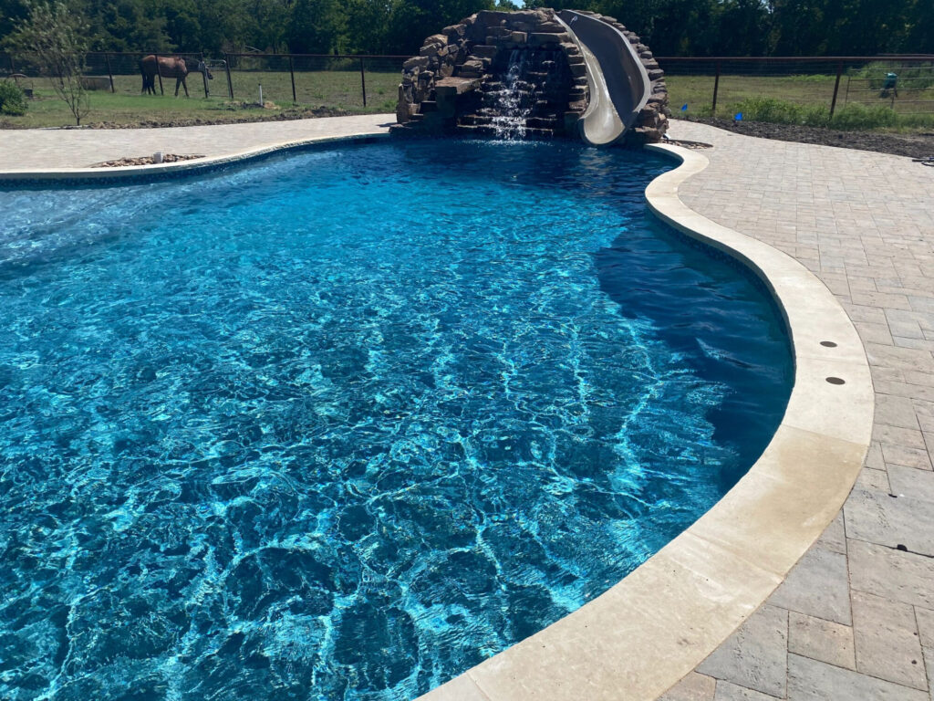 Scrolll Pool Gallery | Texas Tropic Pools